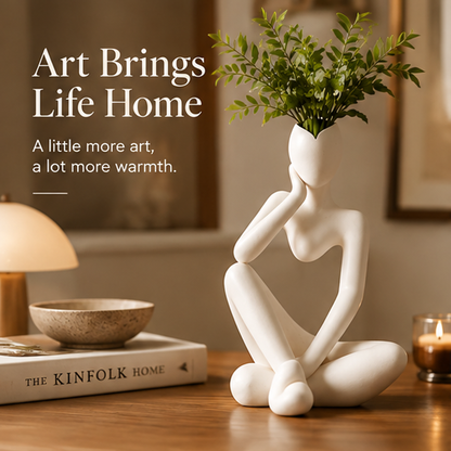 Woman admiring abstract thinker figure vase with text: More Than Just Decor, A piece of art for your home